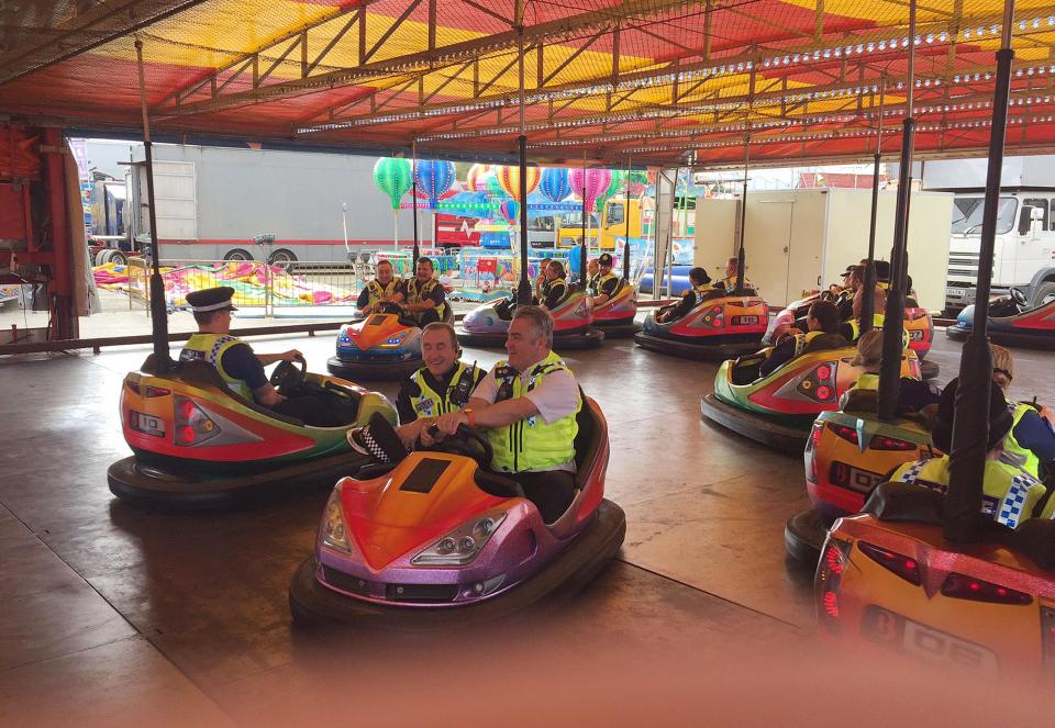  Police officers from Humberside were filmed messing about in bumper cars at a funfair they were patrolling