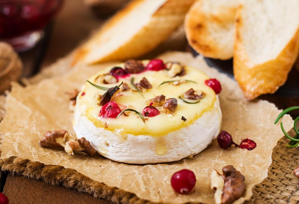  Add cloves of garlic into your camembert to make it even more tasty