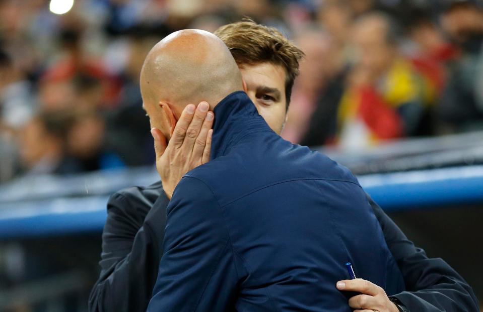  Mauricio Pochettino and Zinedine Zidane embrace prior to the 1-1 draw in the Champions League at the Bernabeu