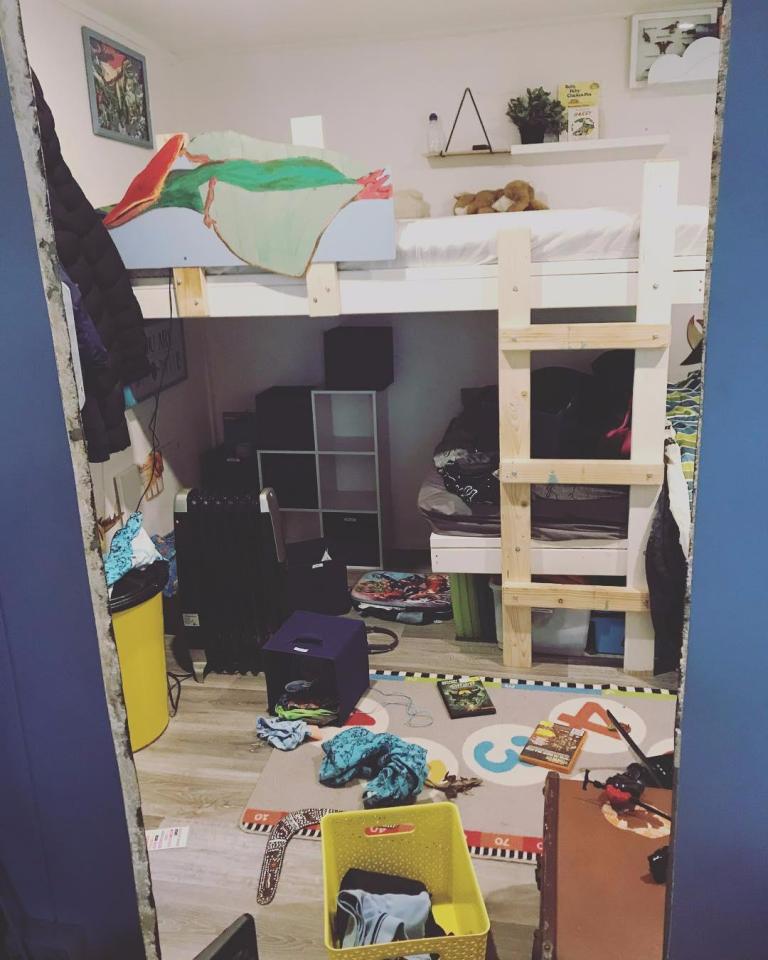  Her two sons share a room inside the house, pictured