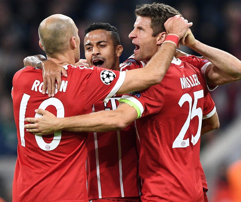  Bayern stars help Thomas Muller celebrate hitting the opening goal against Celtic