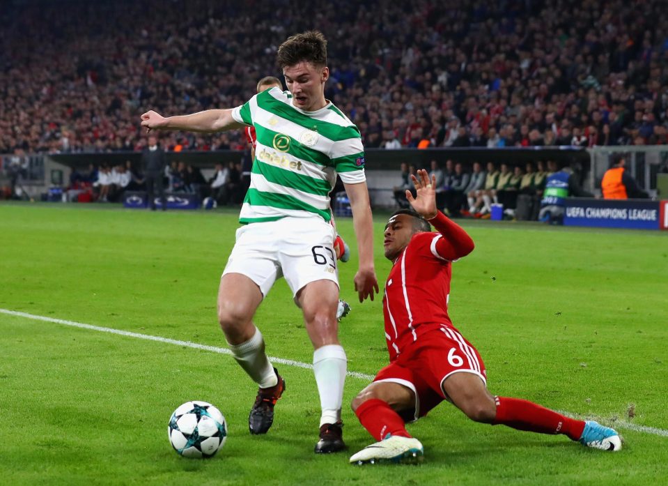  Kieran Tierney gets to the ball against Bayern Munich at the Allianz Arena