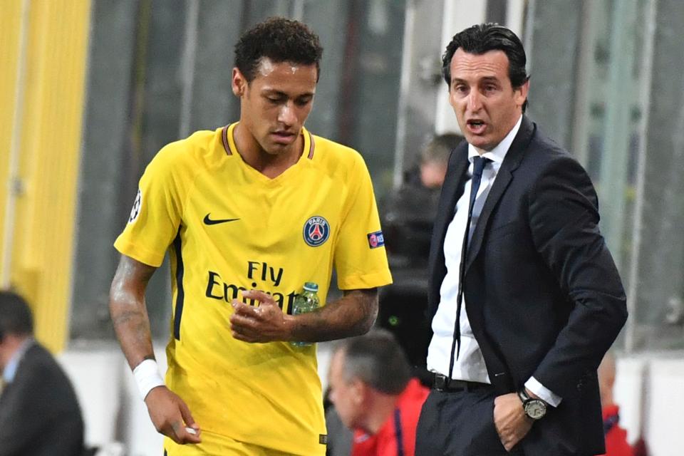  Unai Emery looks on at Neymar during a Champions League match against Anderlecht