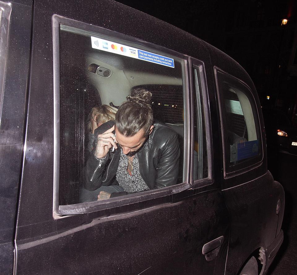  Pete was seen on the phone in the back of the black cab