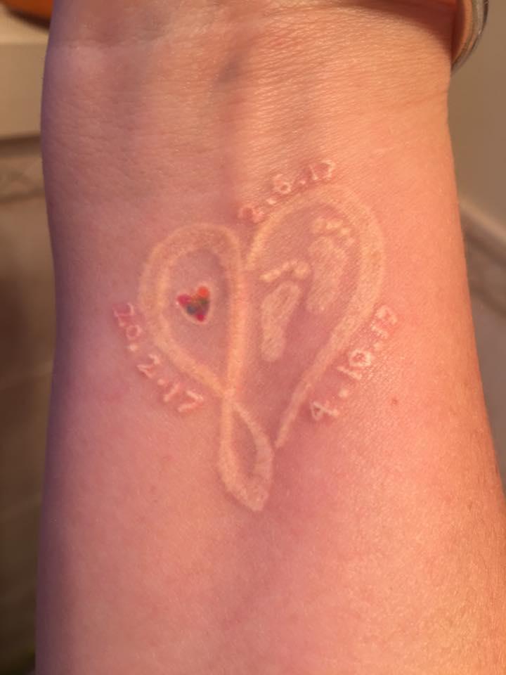  The grieving mum has a touching angel tattoo tribute to her lost babies