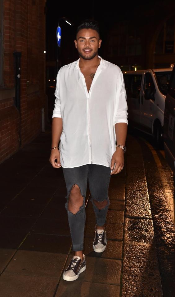  While Nathan Henry looked smart in a long white shirt and ripped jeans