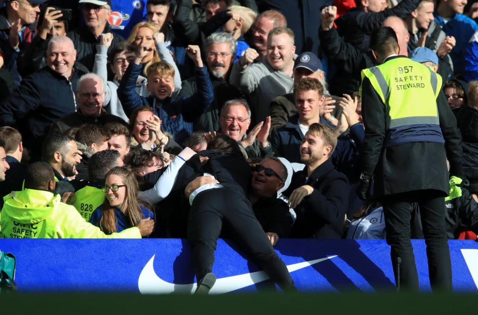  Antonio Conte dives into the Stamford Bridge crowd during Watford victory