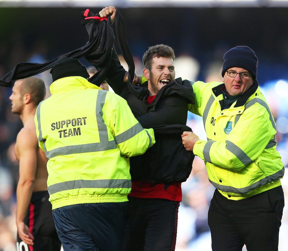  Even so, the Arsenal supporter is able to momentarily show off his trophy