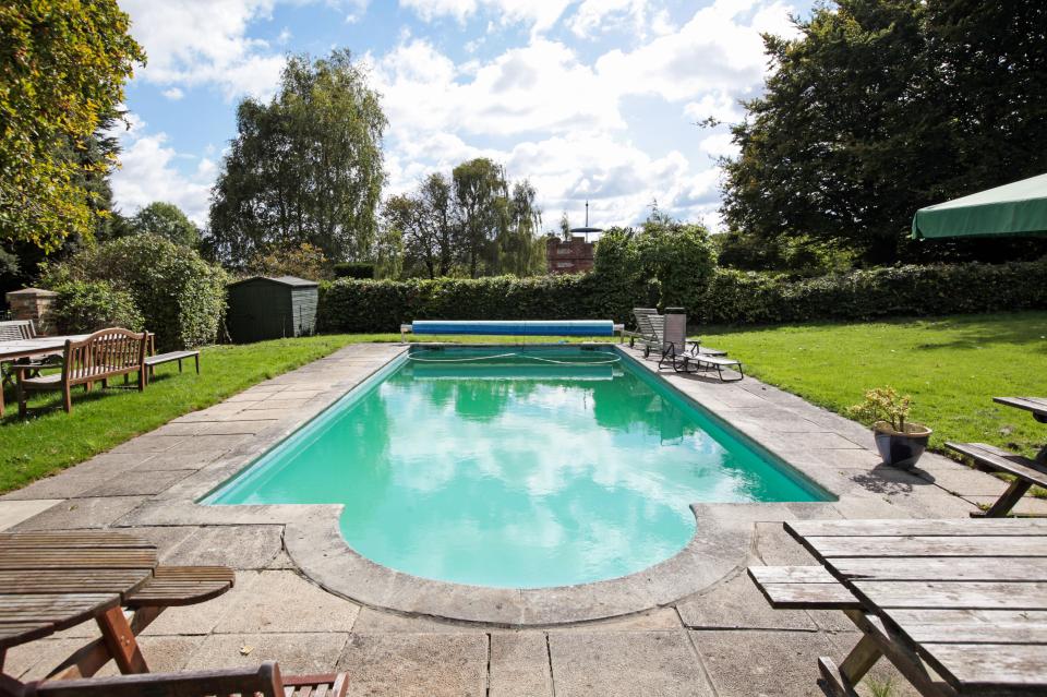  The mansion also boasts a large swimming pool in the back garden