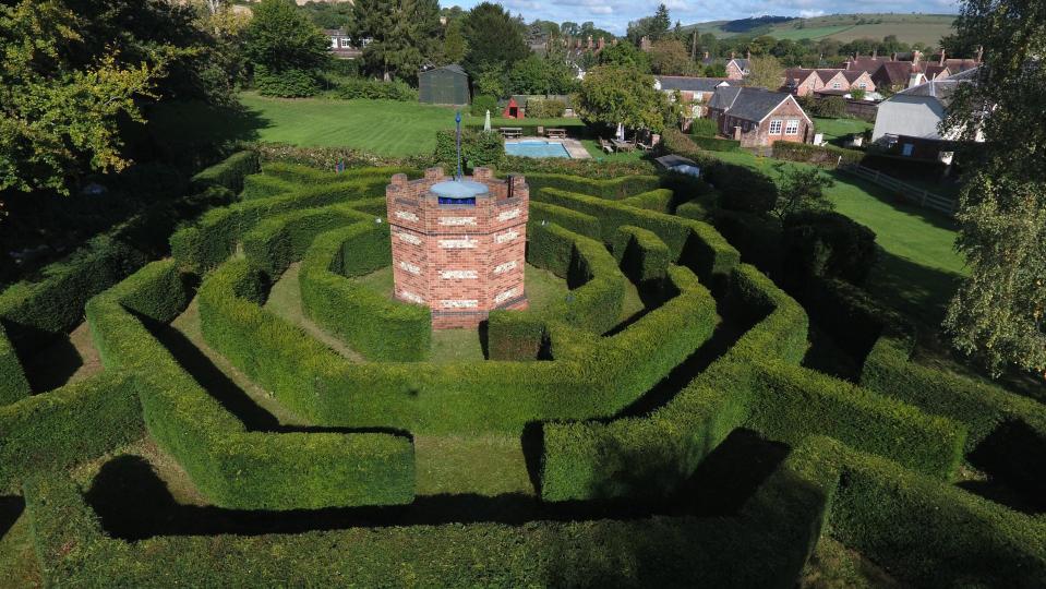  The property comes with a stunning maze in the back garden, complete with 16-foot folly tower