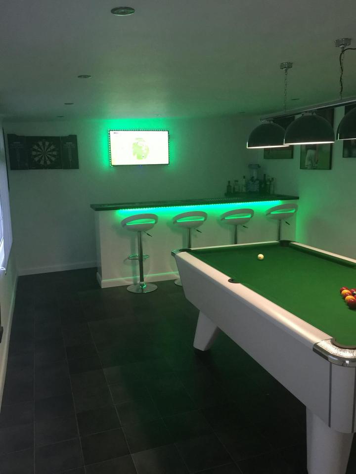  The green-themed bar and snooker room even has a dart board