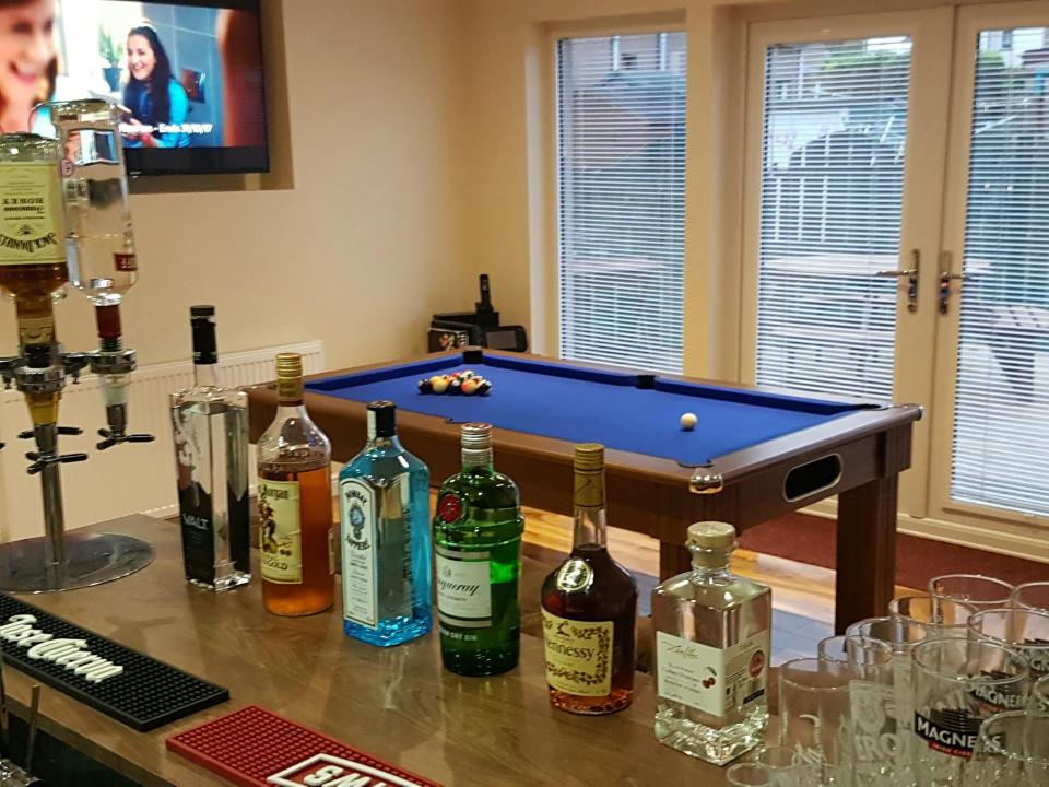  Graeme Strachan's man cave is kitted out with a well-stocked bar