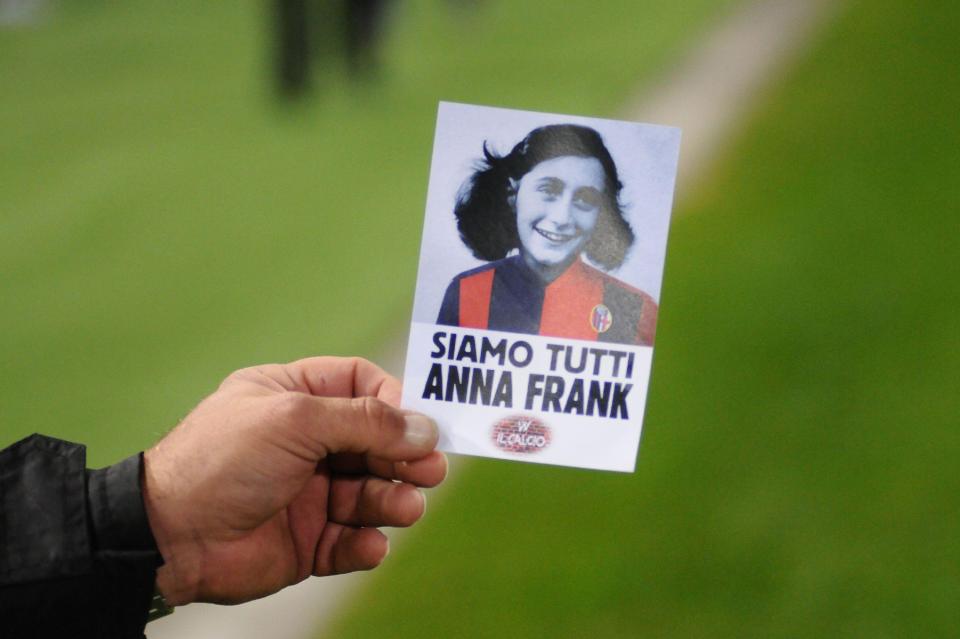  Fans were handed placards which read 'We are all Anne Frank' before match