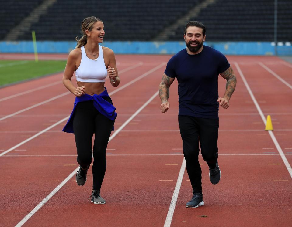 Vogue Williams showed off her washboard abs in a white crop top 