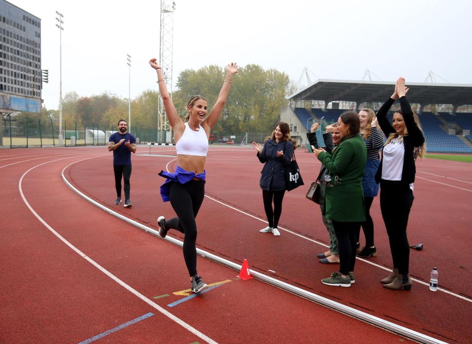 Vogue held her arms aloft as she crossed the finish line 