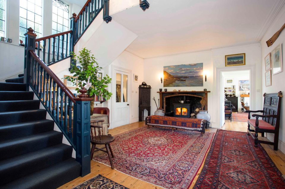 The inside of the house is just as grand and spectacular as the view outside, with a huge staircase and airy entrance