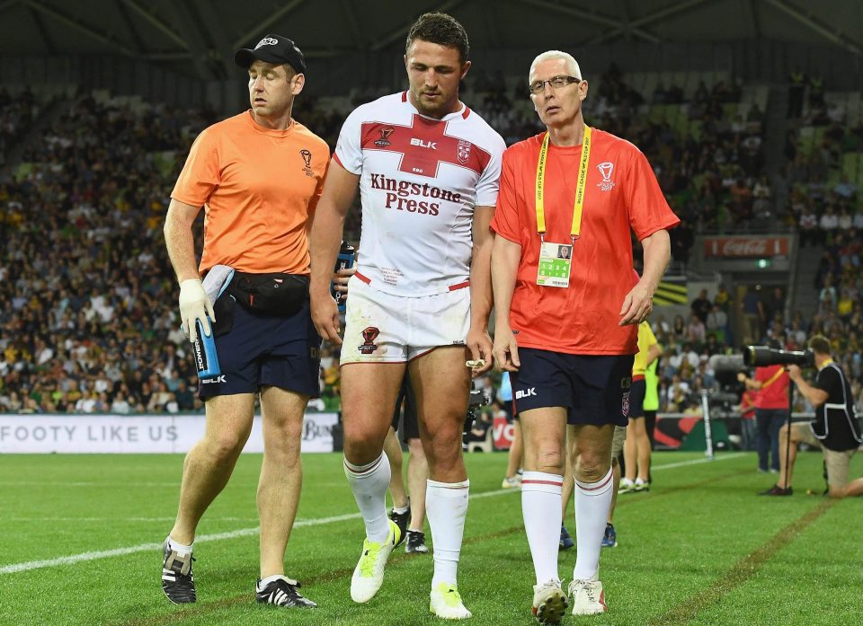  Sam Burgess is helped off against Australia