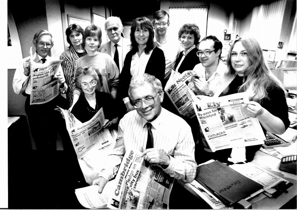  Colin Moule (pictured centre) started work at the news in 1952 and is among those who said no one had taken the call