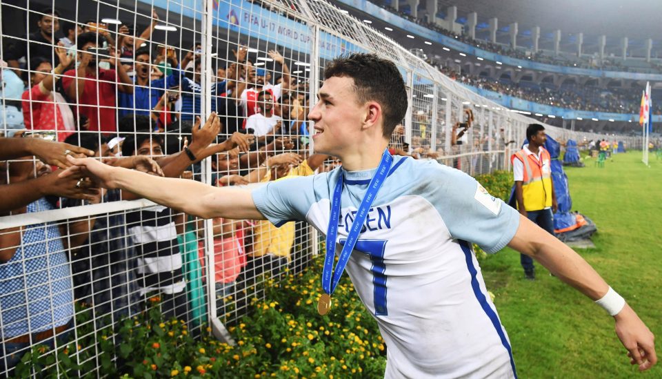  Nice job, Phil. Foden receives congratulations from friends and family