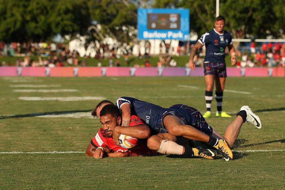  Scotland are too late in their attempts to stop Sika Peni Terepo score a try