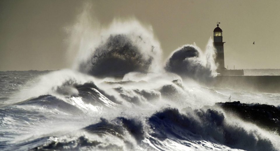  Waves powered by northerly winds crash into the sea wall at Seaham in County Durham