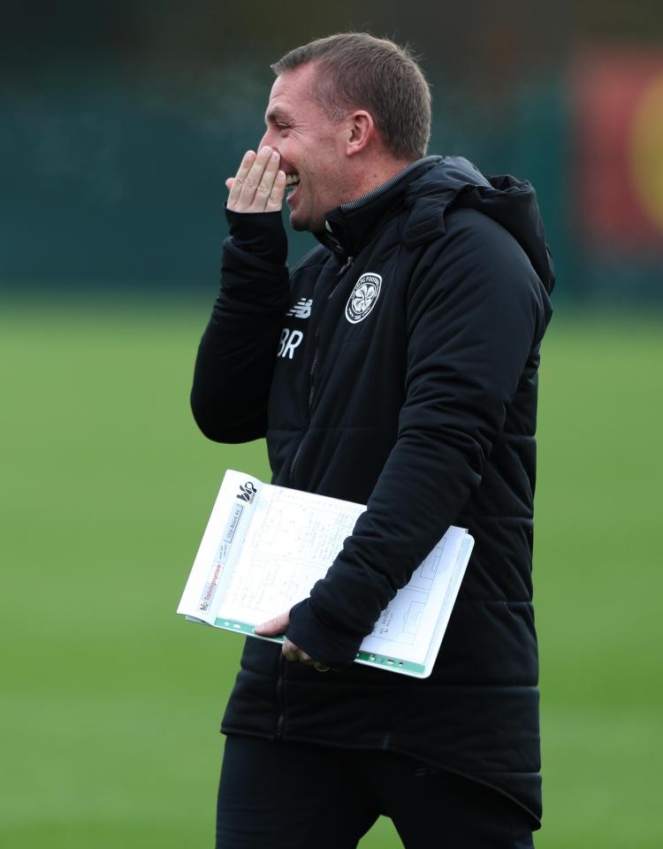  Brendan Rodgers smiles as he issues instructions