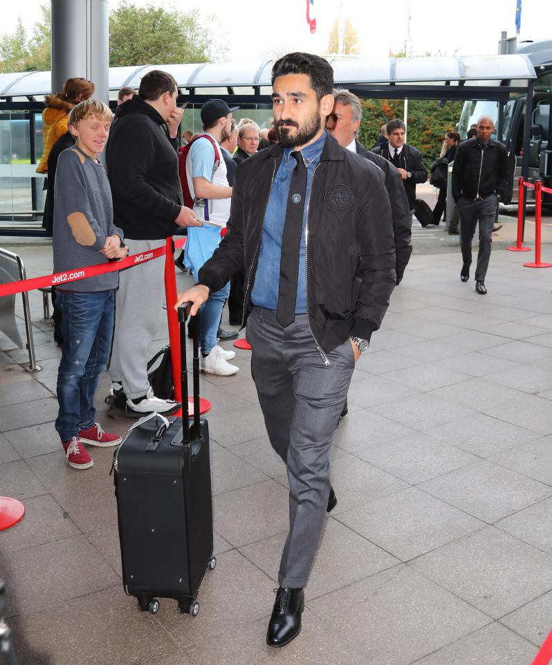  Ilkay Gundogan looks not too pleased with the hipster look