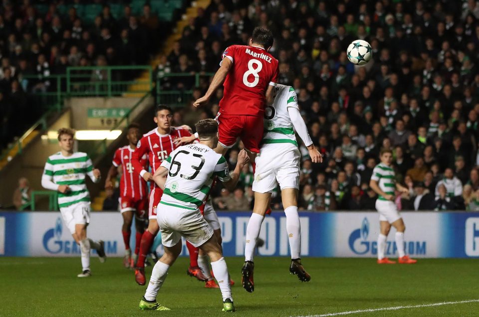  Javi Martinez heads in the winner for Bayern