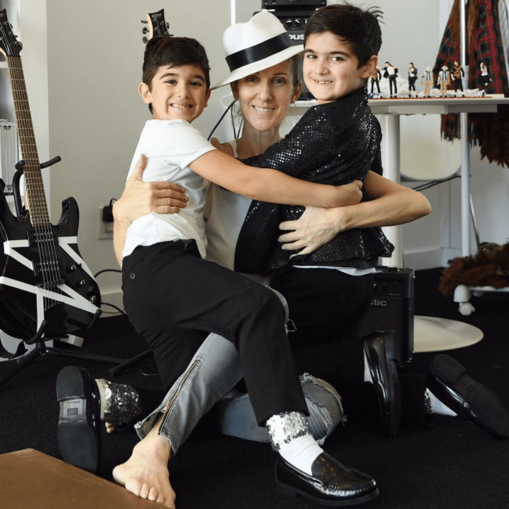 Celine Dion poses with her twin sons Eddy and Nelson for their birthday