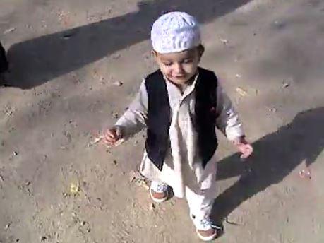  A toddler wanders through the al-Qaeda leader's Pakistan hideout