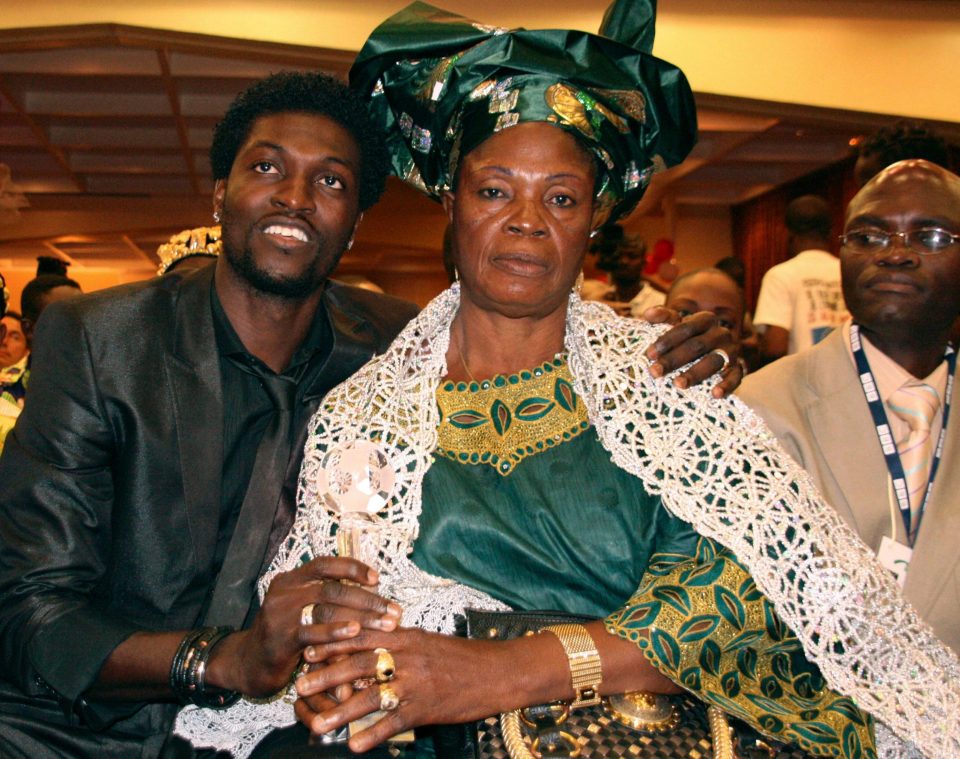  Togo legend Emmanuel Adebayor hugs his mother as he attends a ceremony to receive the 2007 BBC African Footballer of the Year trophy