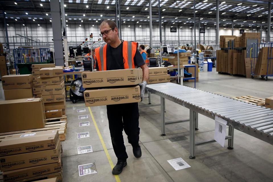  A worker at Amazon's Rugeley fulfilment centre (file photo)