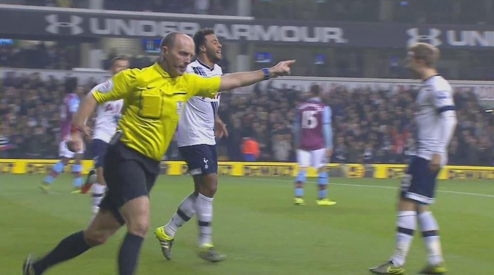  Mike Dean celebrates a Spurs goal against Aston Villa