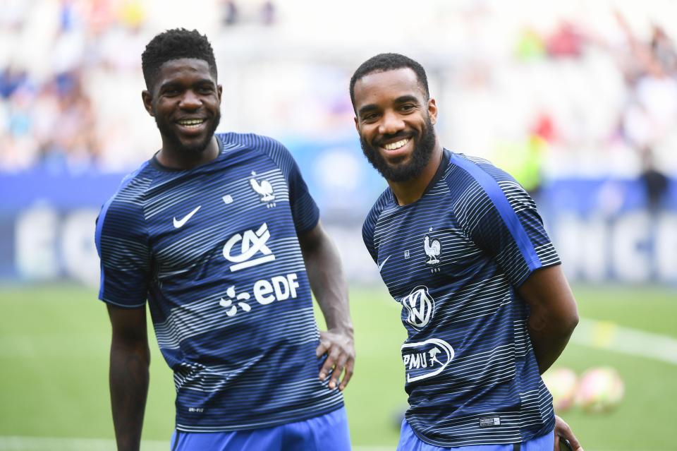  Samuel Umtiti and Arsenal ace Alexandre Lacazette during international duty