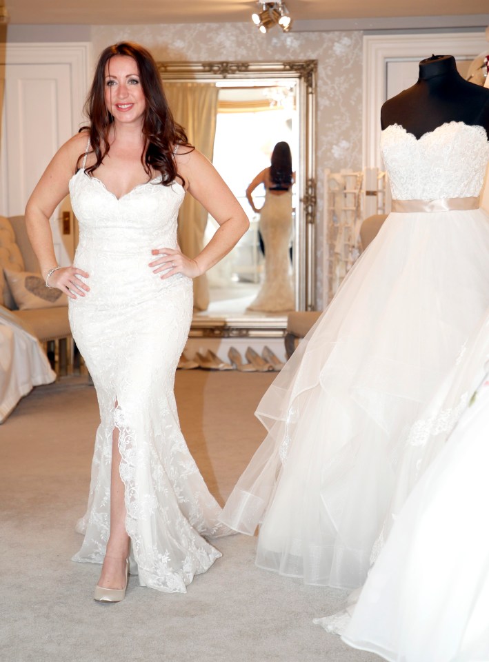 Paula pictured trying on a wedding dress in August – not the one she wore today