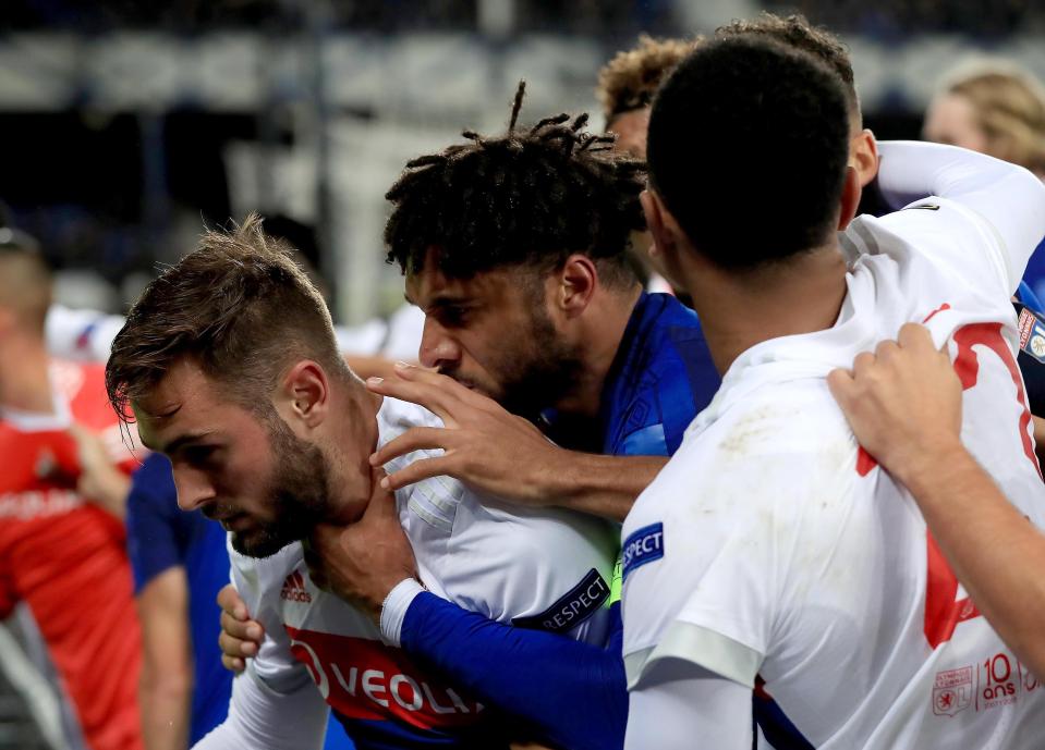  Ashley Williams is at the centre of melee as Everton and Lyon players argue