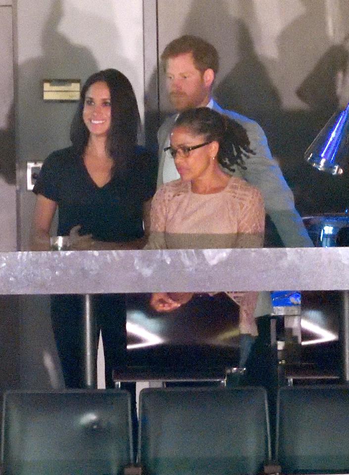  Meghan wore trousers while attending the Invictus Games with Harry and her mum