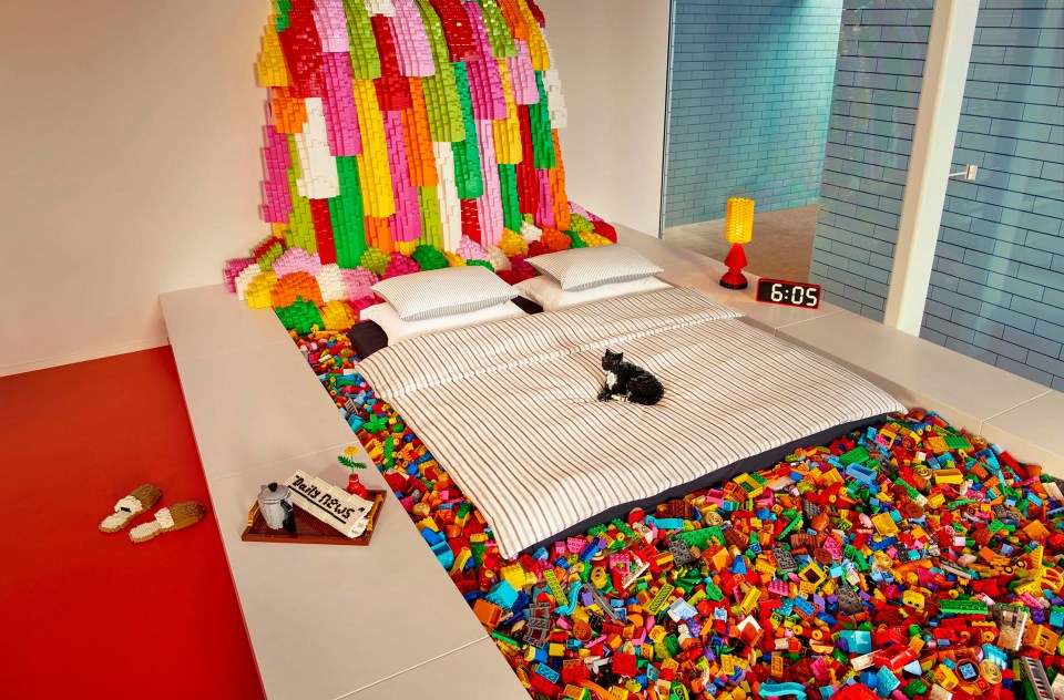 When night falls, the family will bed down in the Lego bedrooms under a six-metre-tall Lego waterfalls 