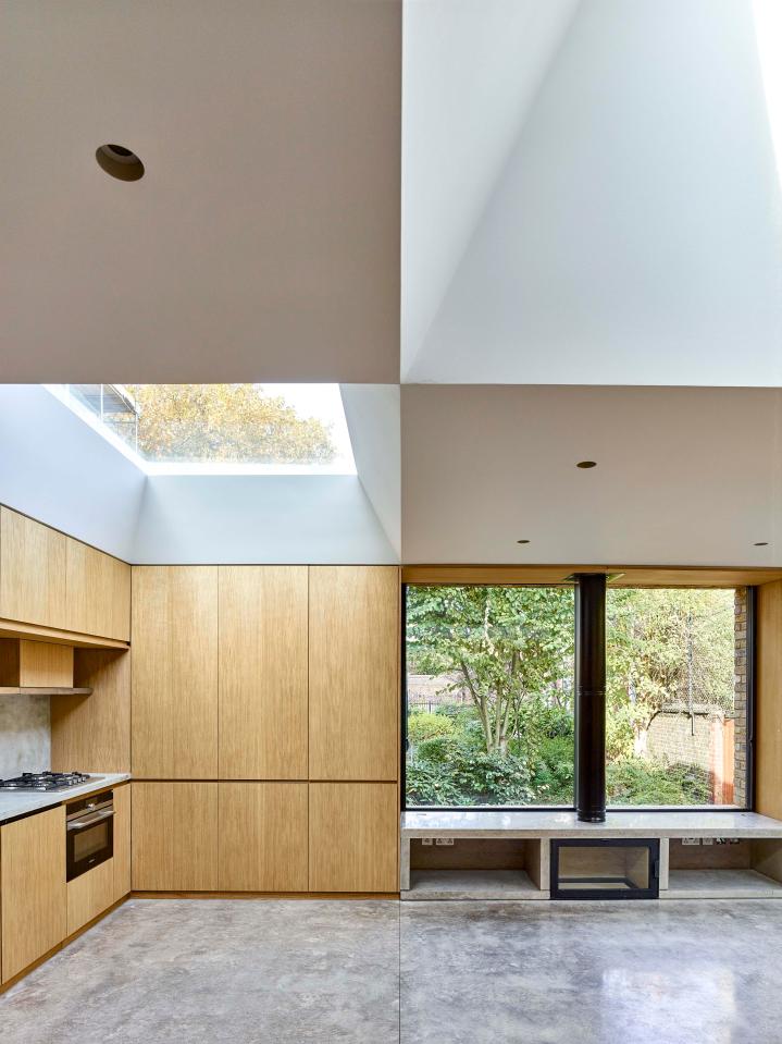  The space's light, open feeling is achieved through the large skylights