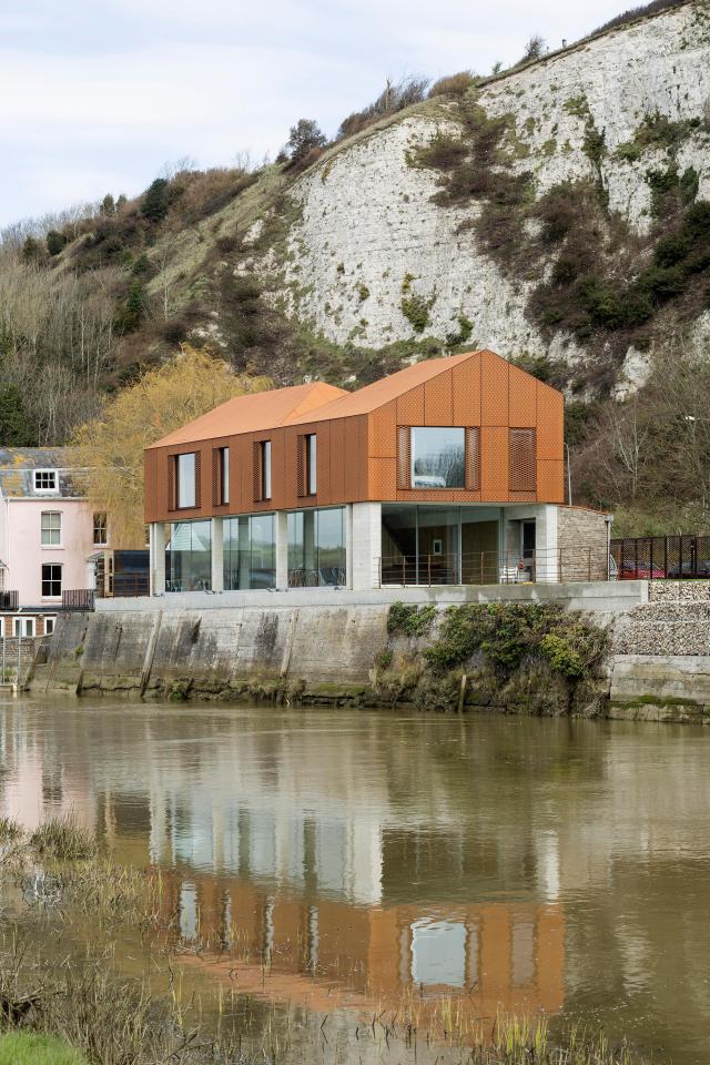  This modern home sits on the River Ouse, with the magnificent cliffs as a backdrop