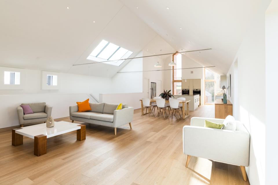  The first floor's large open-plan living space is bright and airy and offers magnificent views over the valley