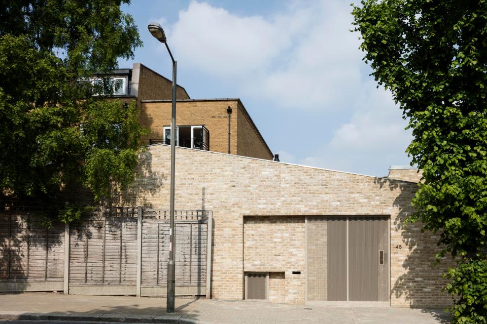  Whole House's designers cleverly turned a traditional garage into a unique and stunning property