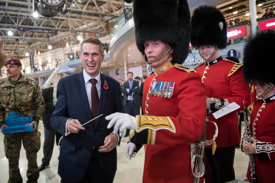 Mr Williamson chatted with military personnel and sold poppies on Poppy Day today