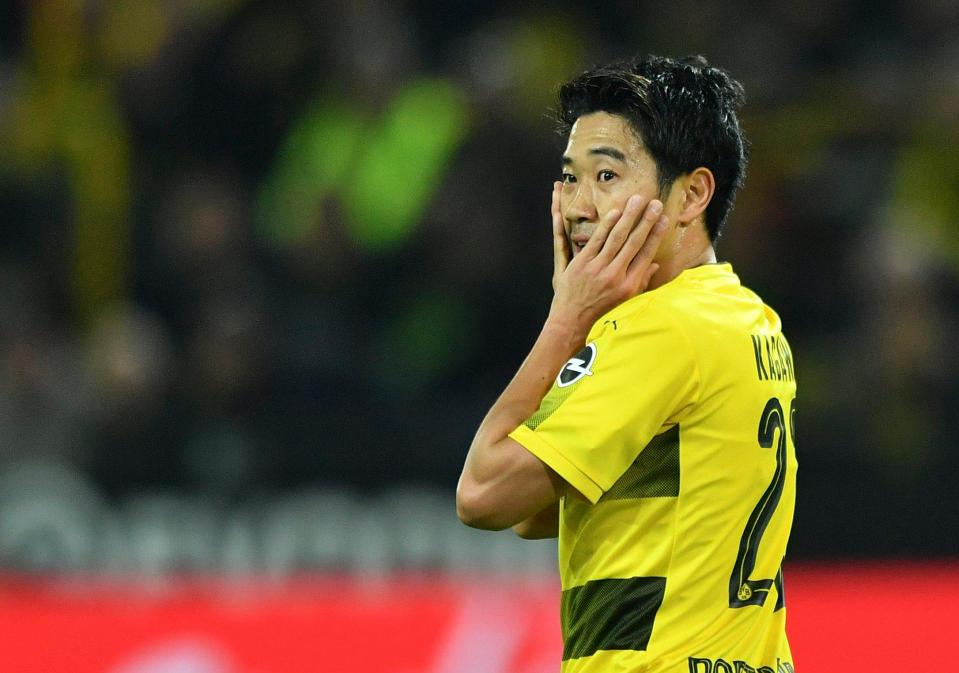  Shinji Kagawa looks on during the Bundesliga fixture