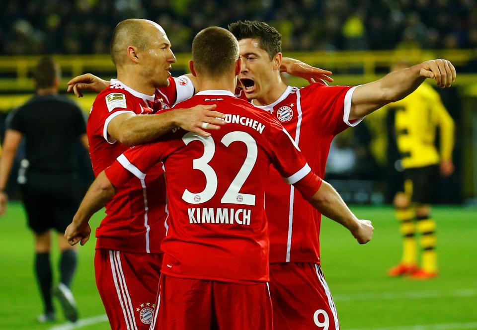  Joshua Kimmich, Arjen Robben and Robert Lewandowski celebrate the second goal