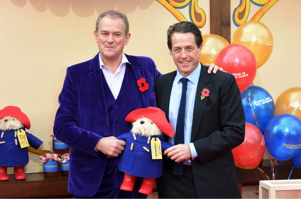  Grant (right) pictured with Hugh Bonneville is currently promoting his new film Paddington 2