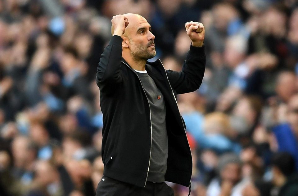  Pep Guardiola celebrates after going ahead against Arsenal during the first half at the Etihad on Sunday