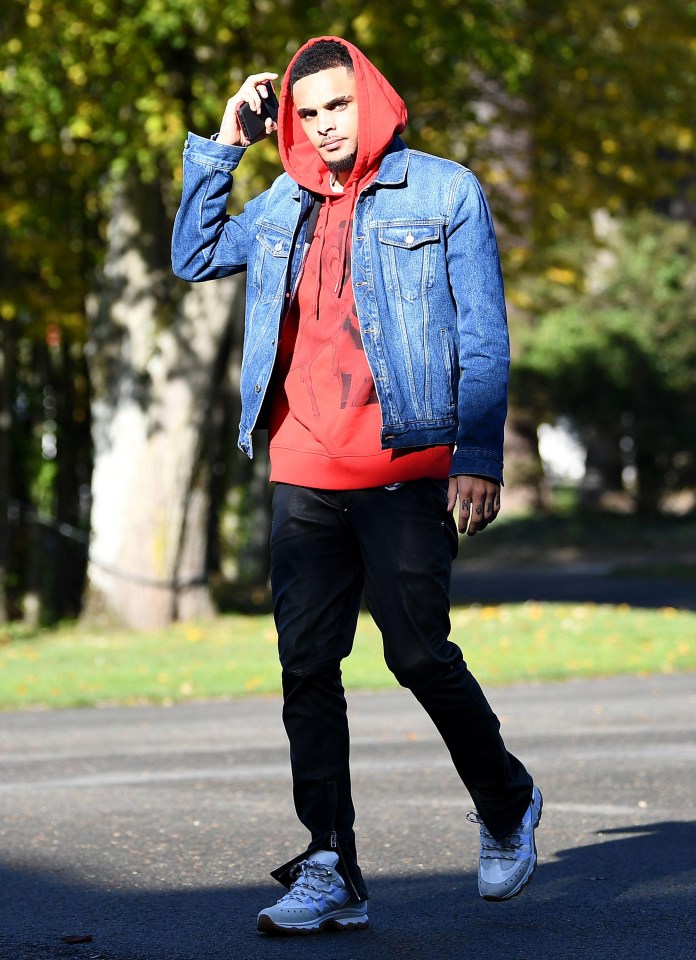 Layvin Kurzawa stands out in red hooded jumper with blue denim jacket 