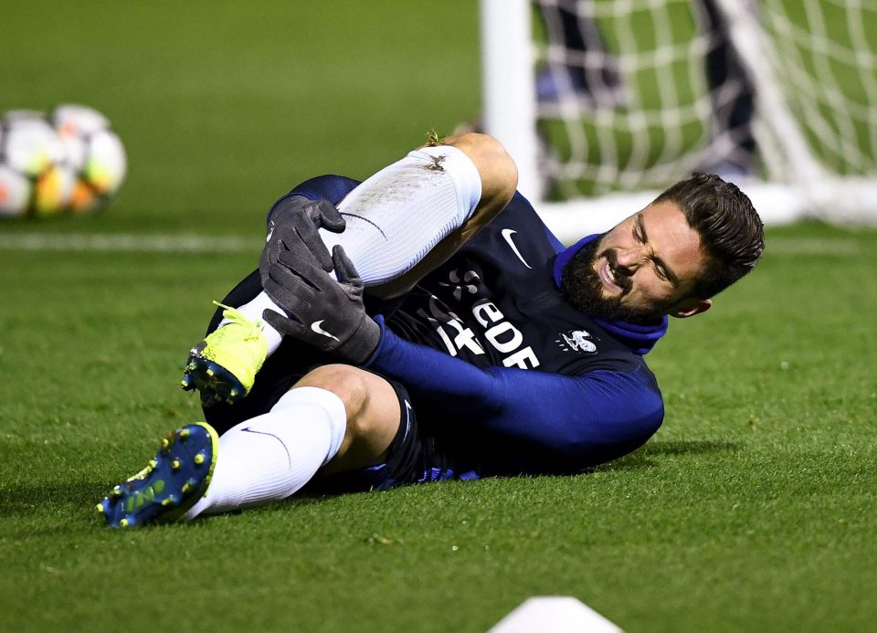  Olivier Giroud was in a lot of pain as he clutched his lower leg after being injured in France training