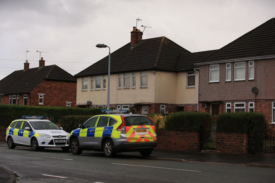 Police outside the family home in Connah’s Quay, North Wales